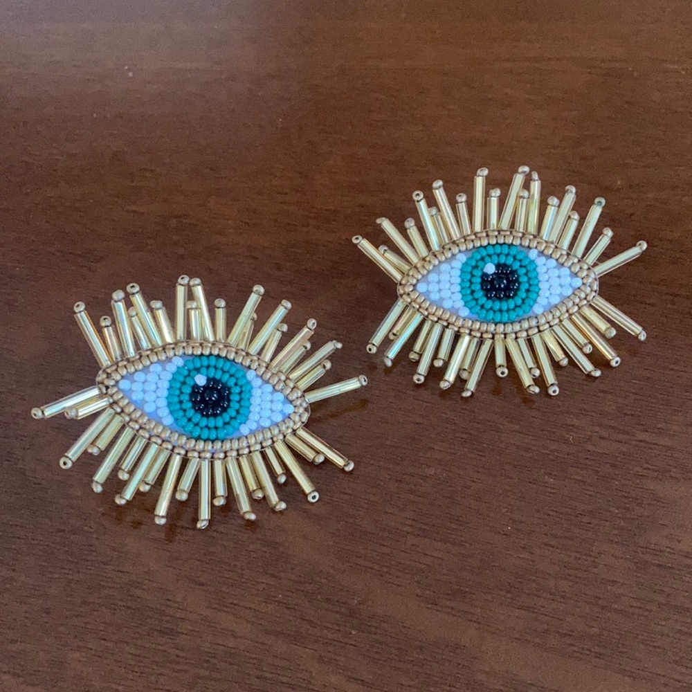 NWOT leather beaded green eye post earrings